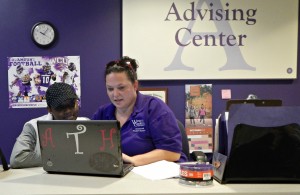 Anna Thompson, the administrative support specialist in WCU's Advising Center, helps student Amarillis Harper look for classes on Advising Day. Photo by Shelby LeQuire, Oct. 27, 2015.