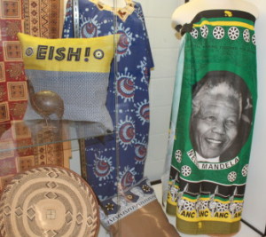 A few of the items loaned to the exhibit by Katy Ginanni. Her favorite piece is the Nelson Mandela fabric on the right. 