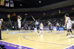 Catamount guard, Devin Peterson attempts a 3 point shot, Feb. 11, 2016. Photo by Chad Grant. 