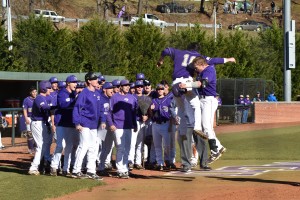 Garrett Brown (10) and Spencer Holcomb (8) celebrate after Spencer hits a home run. Picture by Becca Ross