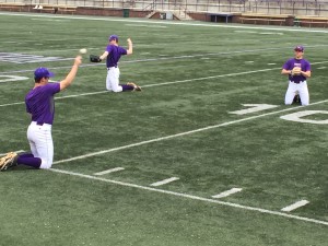 Baseball pitchers warming up in split practice at the football field, Jan. 29 2016. Photo by David Johnson. 