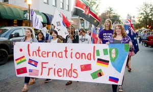 WCU international students march down Main Street in Sylva during the 2015 Homecoming parade. Photo from WCU News. 