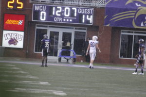 Slippery when wet: Catamounts fall to Paladins on Homecoming