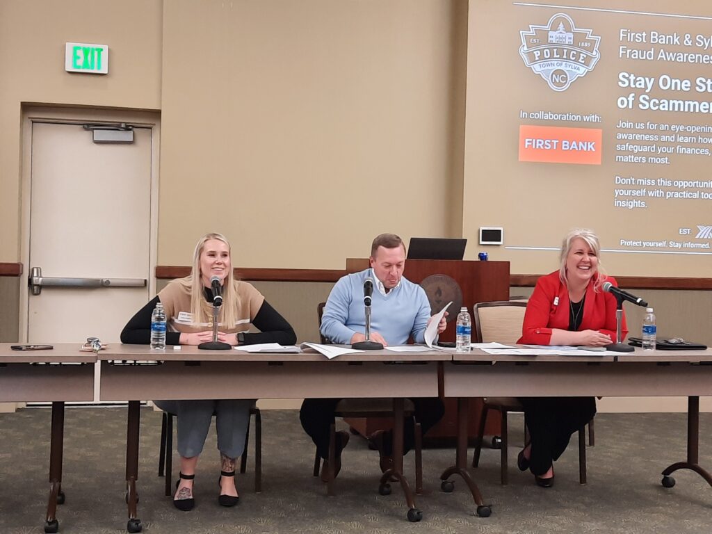 (Left to right) Lexie Franklin, First Bank Sylva Branch Manager, Robbie Carter, Sylva Assistant Chief of Police, Meka Woodring, First Bank Area Retail Manager/Vice President during the SCC discussion on fraud and scam on March 24. Photo by Becki Veach.