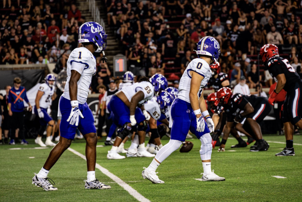 Wide receivers Jai Boyd (1) and AJ Colombo (0) line up before a snap. Boyd led the Catamounts with six catches for 32 yards, while Colombo added two receptions for 17 yards. Photo by Andrew Birt-Gombar.